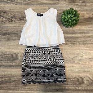 This is an Amy Byer formal black and white dress